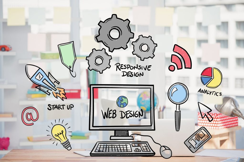 Schițe și wireframe-uri pentru un site web, pe birou
